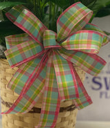 Add on a seasonal bow to enhance your arrangement. Colors and style vary.